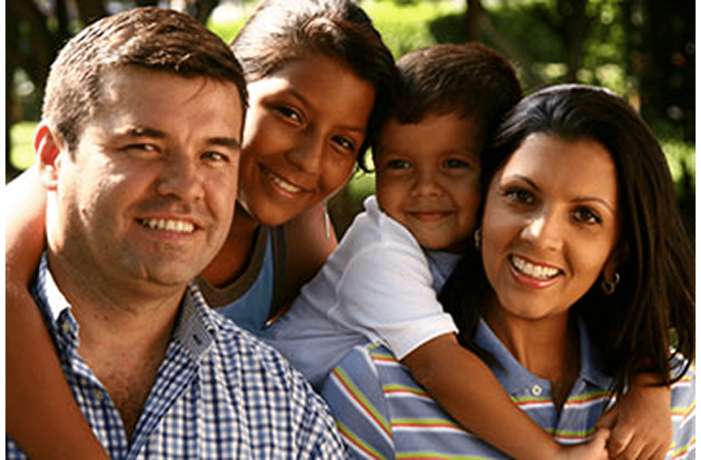 Smiling family enjoying a sunny day