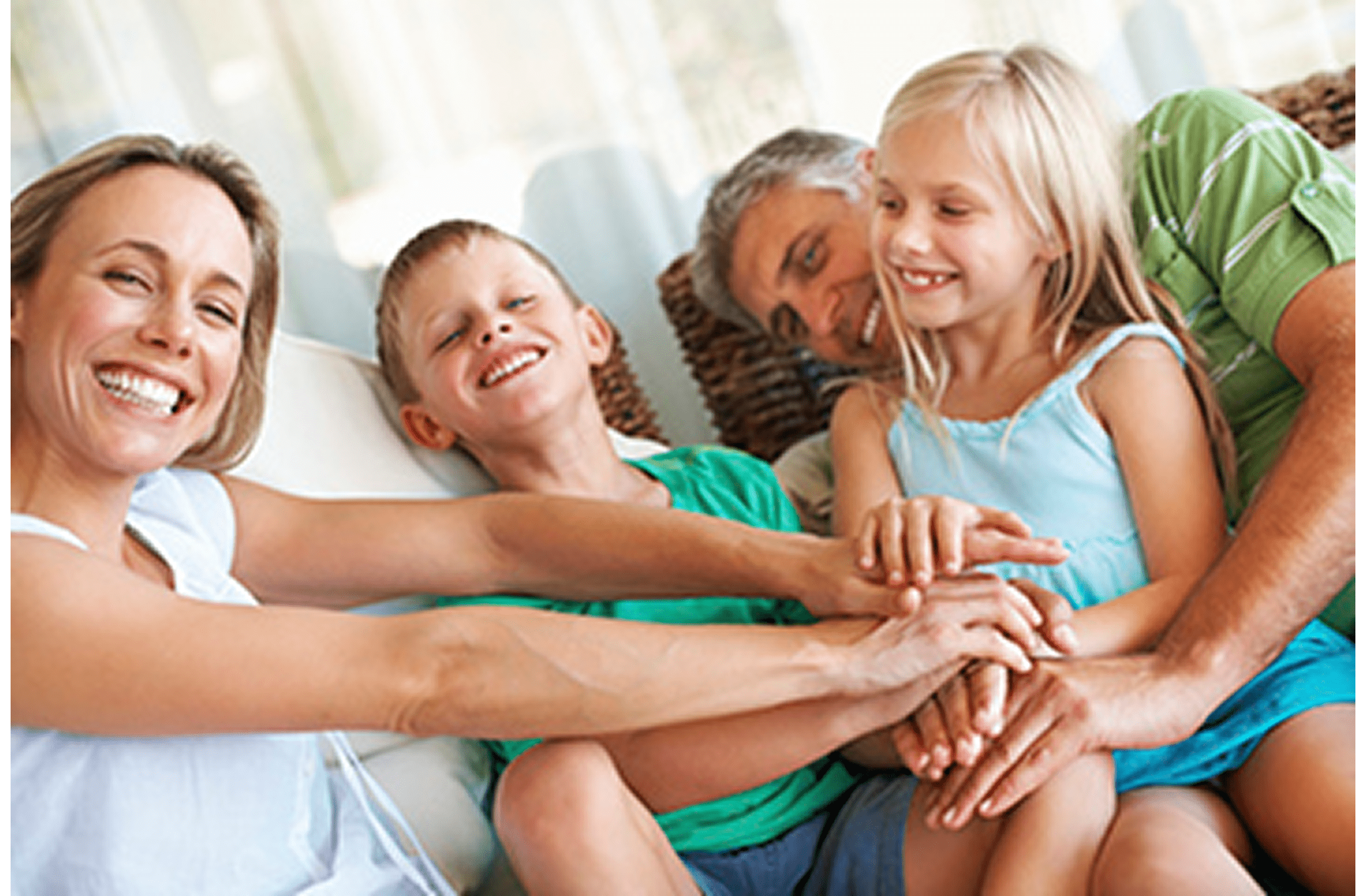 Happy family bonding on couch