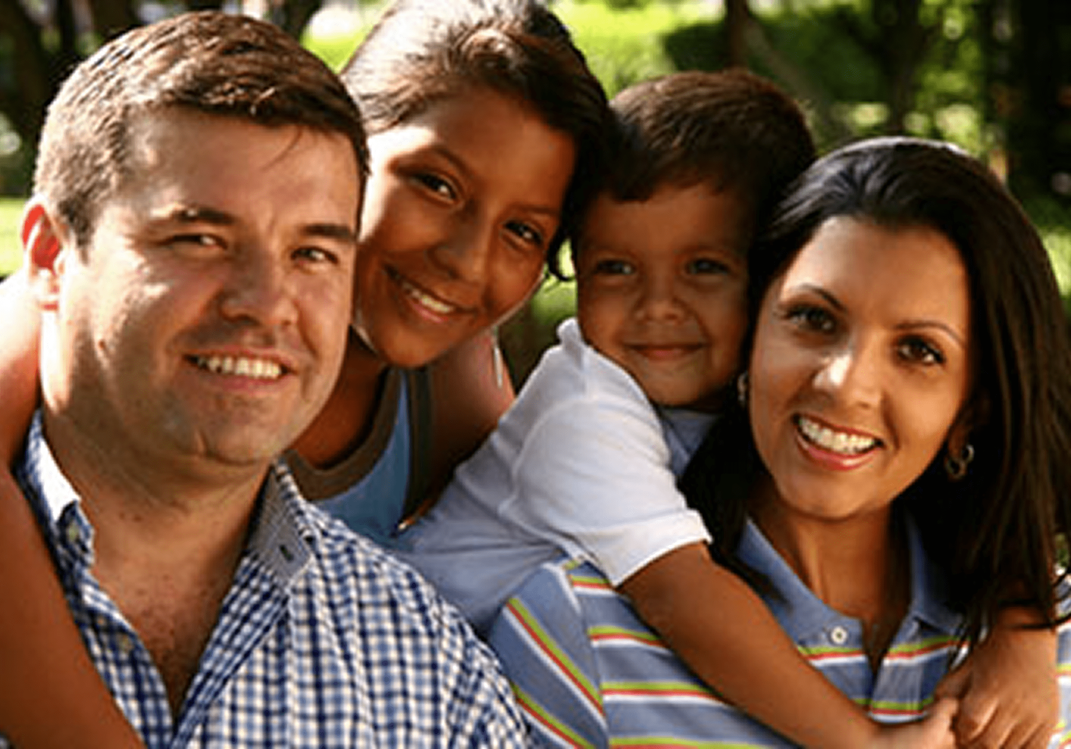 Smiling family enjoying a sunny day