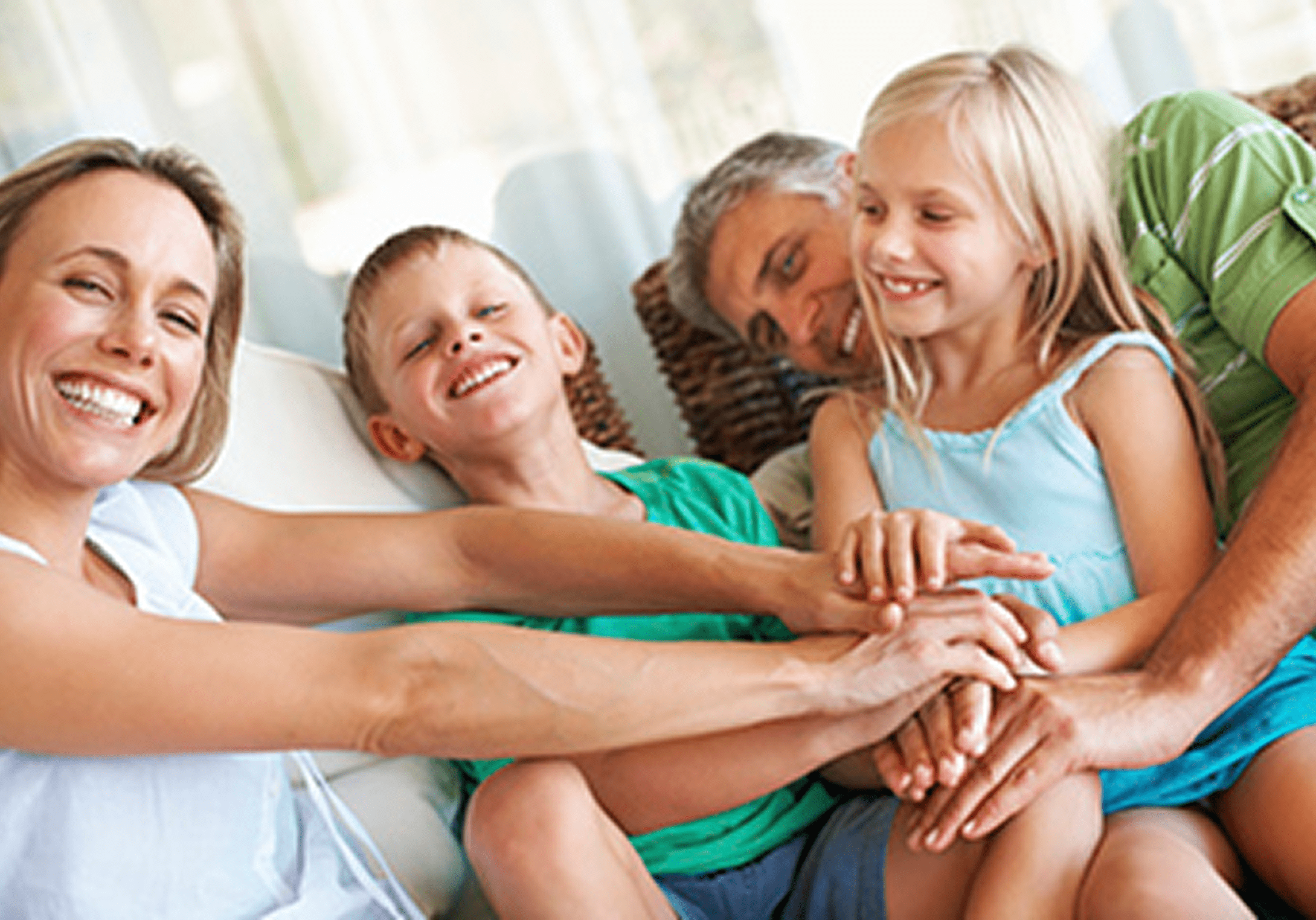 Happy family bonding on couch